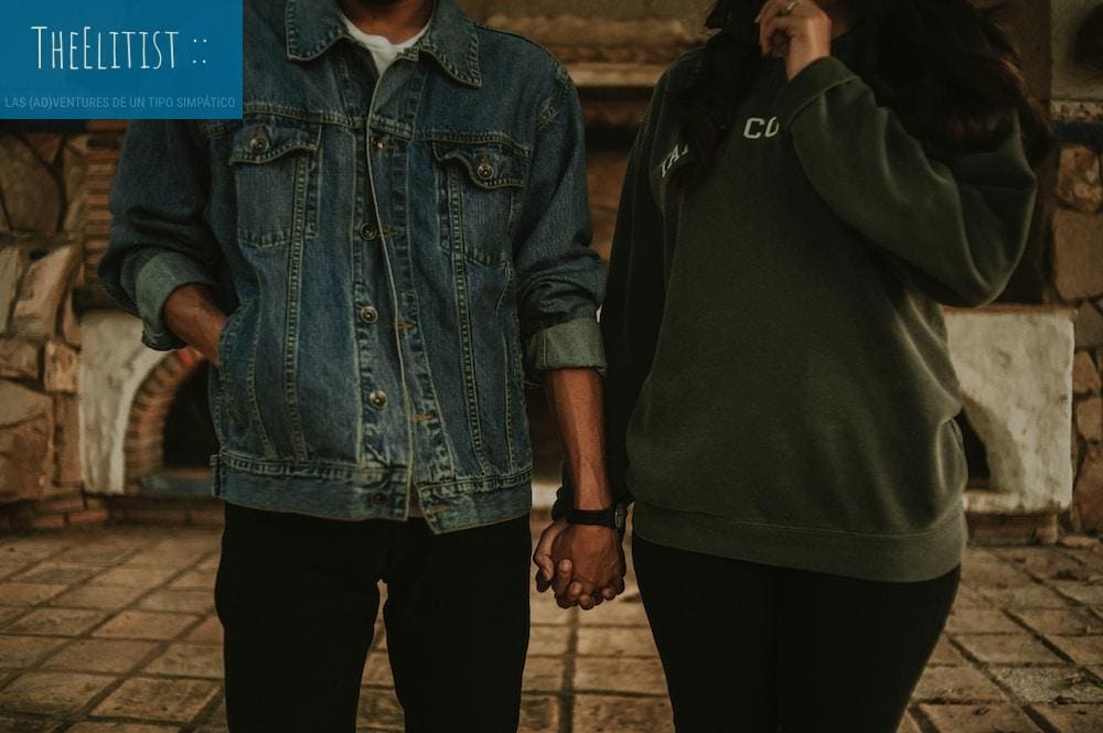 man and woman holding hands