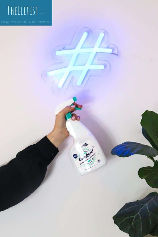 person holding white plastic bottle