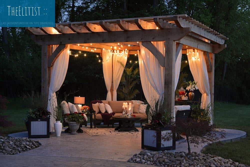 photo of gazebo with curtain and string lights